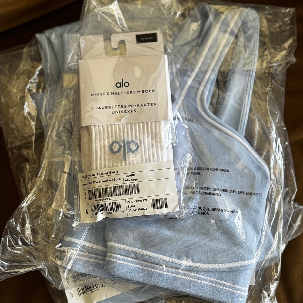 NWT Alo Yoga Heart Throb Bra and Half Crew Socks in limited color Seashell Blue